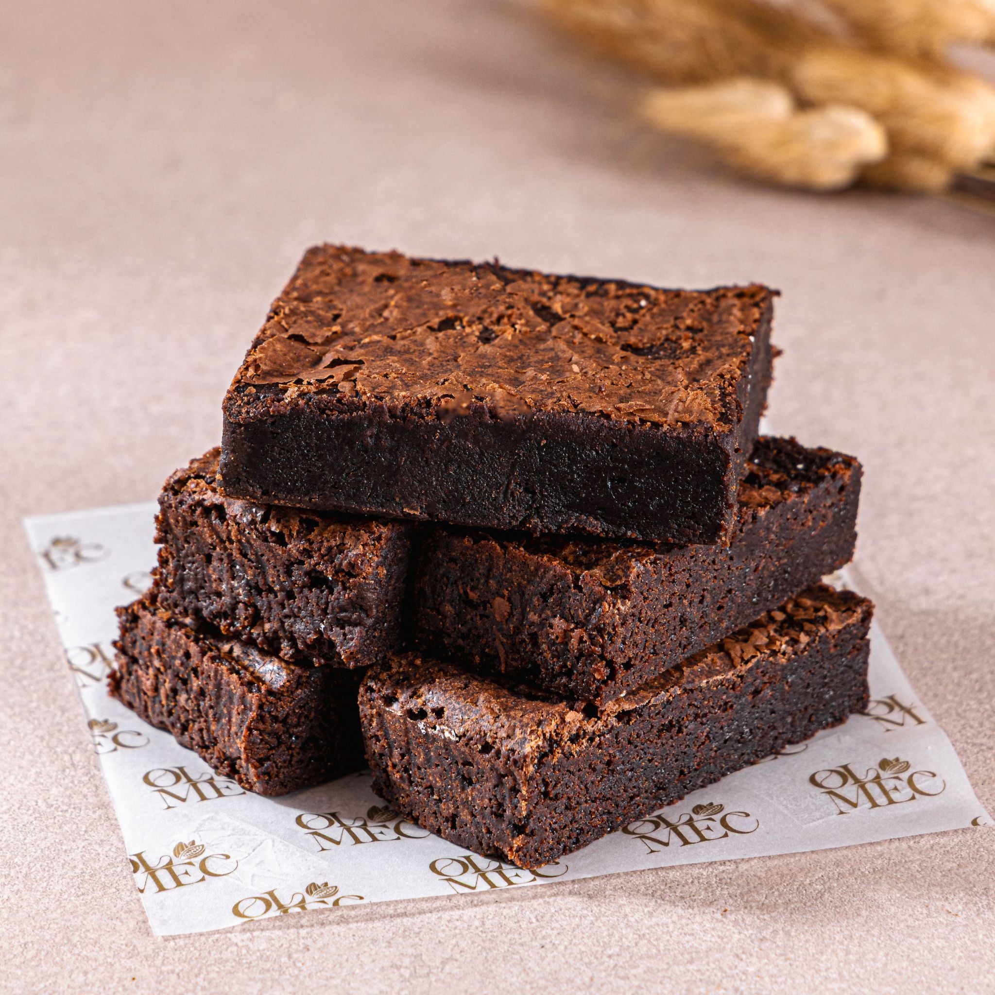 Rich fudgy American Brownie squares with glossy chocolate texture